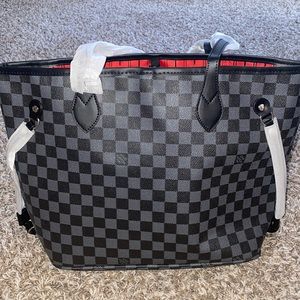 Large black checkered bag